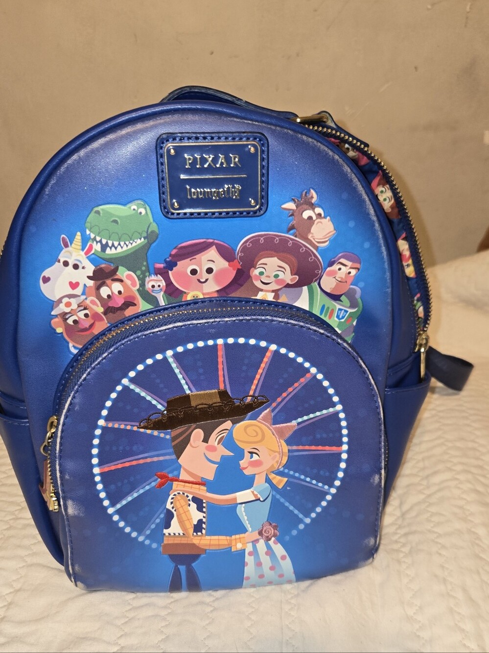 Pixar , Loungefly Blue Mini Backpack Purse with Gold Hardware